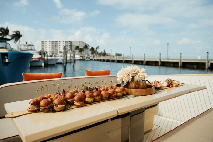 A catered spread served on the aft deck at the marina