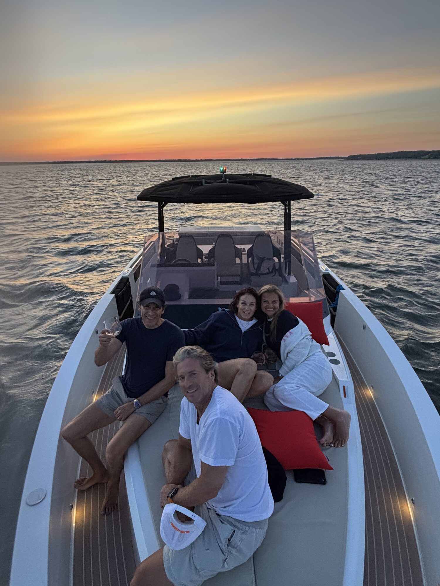 Golden hour cruise with friends aboard a Yacht Hampton charter