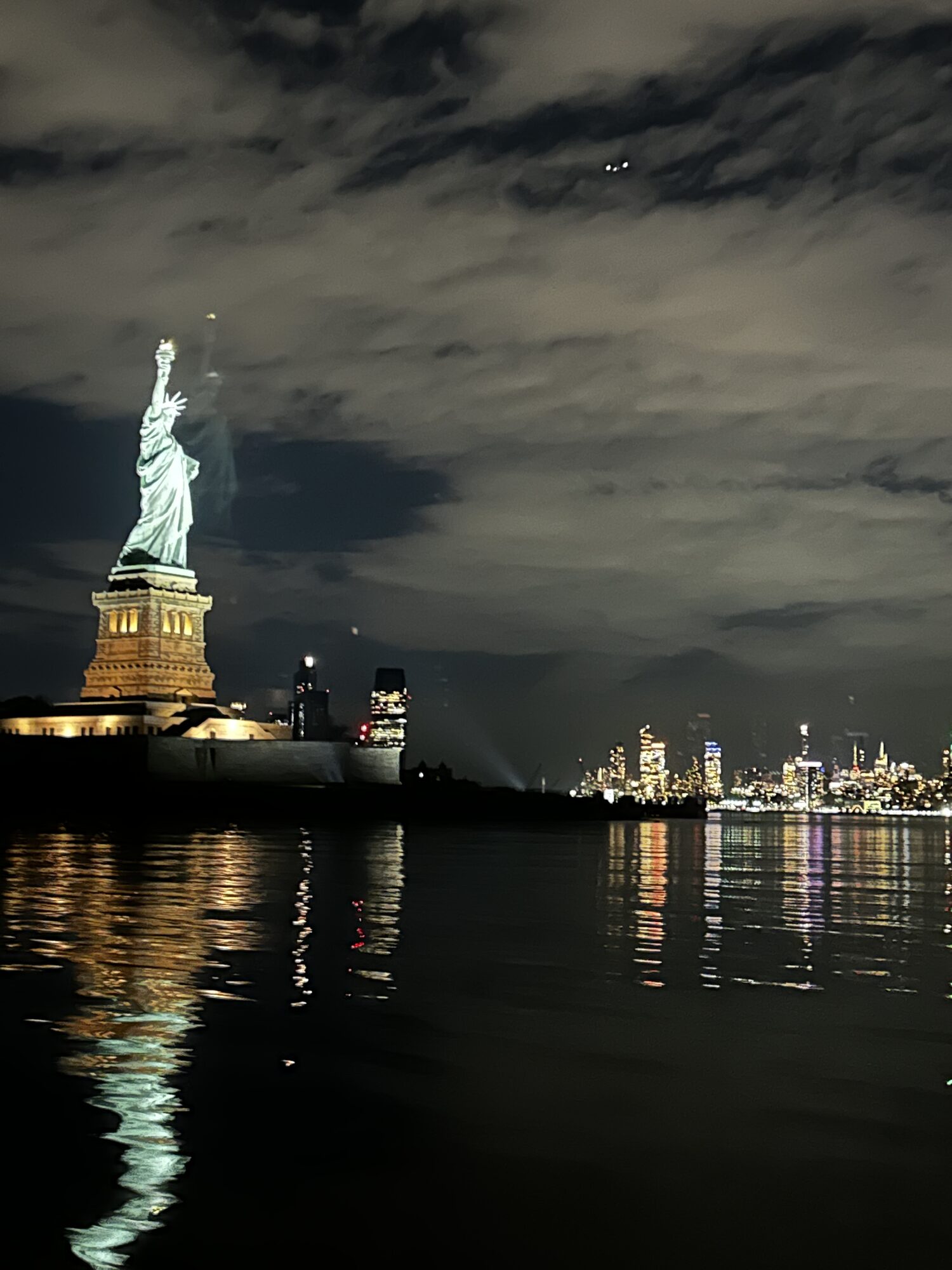 Passing the Statue of Liberty on a New York Harbor charter