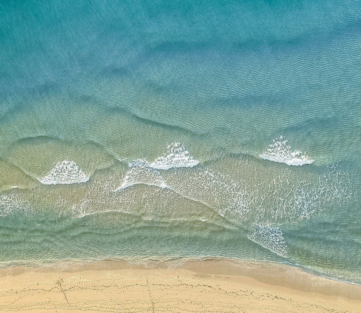 Waves crashing on beach