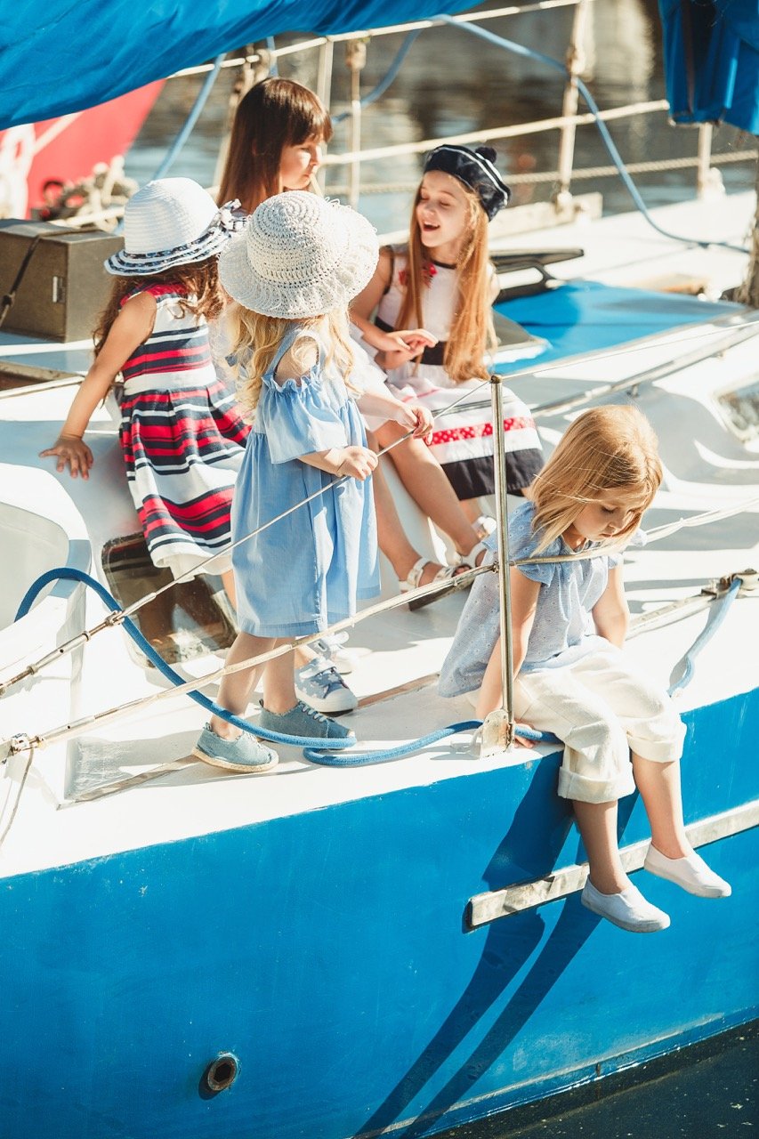 the-children-on-board-of-sea-yacht-2022-02-02-03-49-08-utc Large