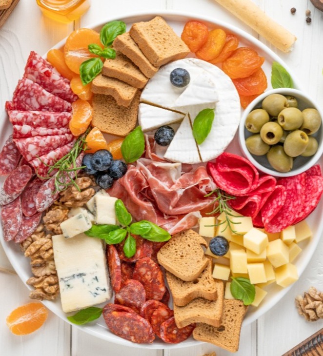 charcuterie-board-with-a-variety-of-cheeses-meat-2022-11-01-01-47-41-utc-1-1