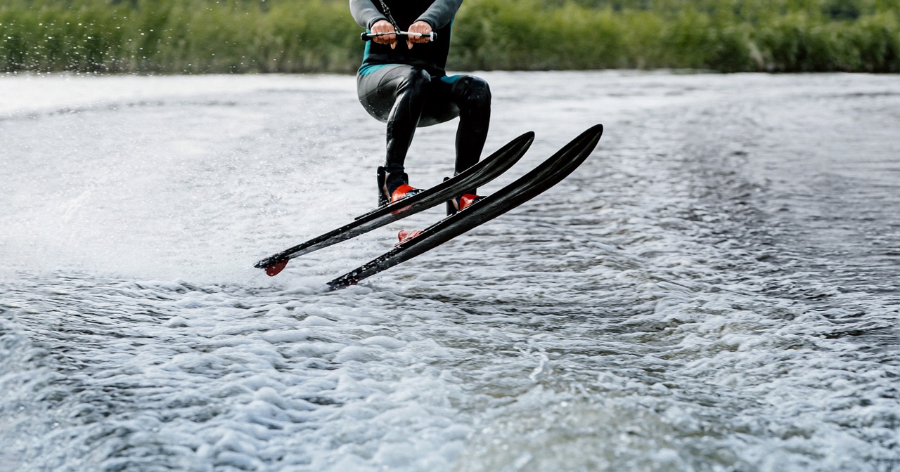 man-waterskiing-on-lake-behind-boat-2021-08-27-19-14-58-utc Large
